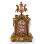 19th century French gilt metal mantel clock, with pink Sèvres style porcelain panels, hand painted