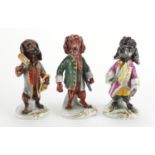 Three Unter Weiss Bach hand painted porcelain dogs, factory marks and impressed numbers to the