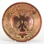 19th century Middle Eastern lustre pottery shallow bowl, hand painted with a double headed eagle