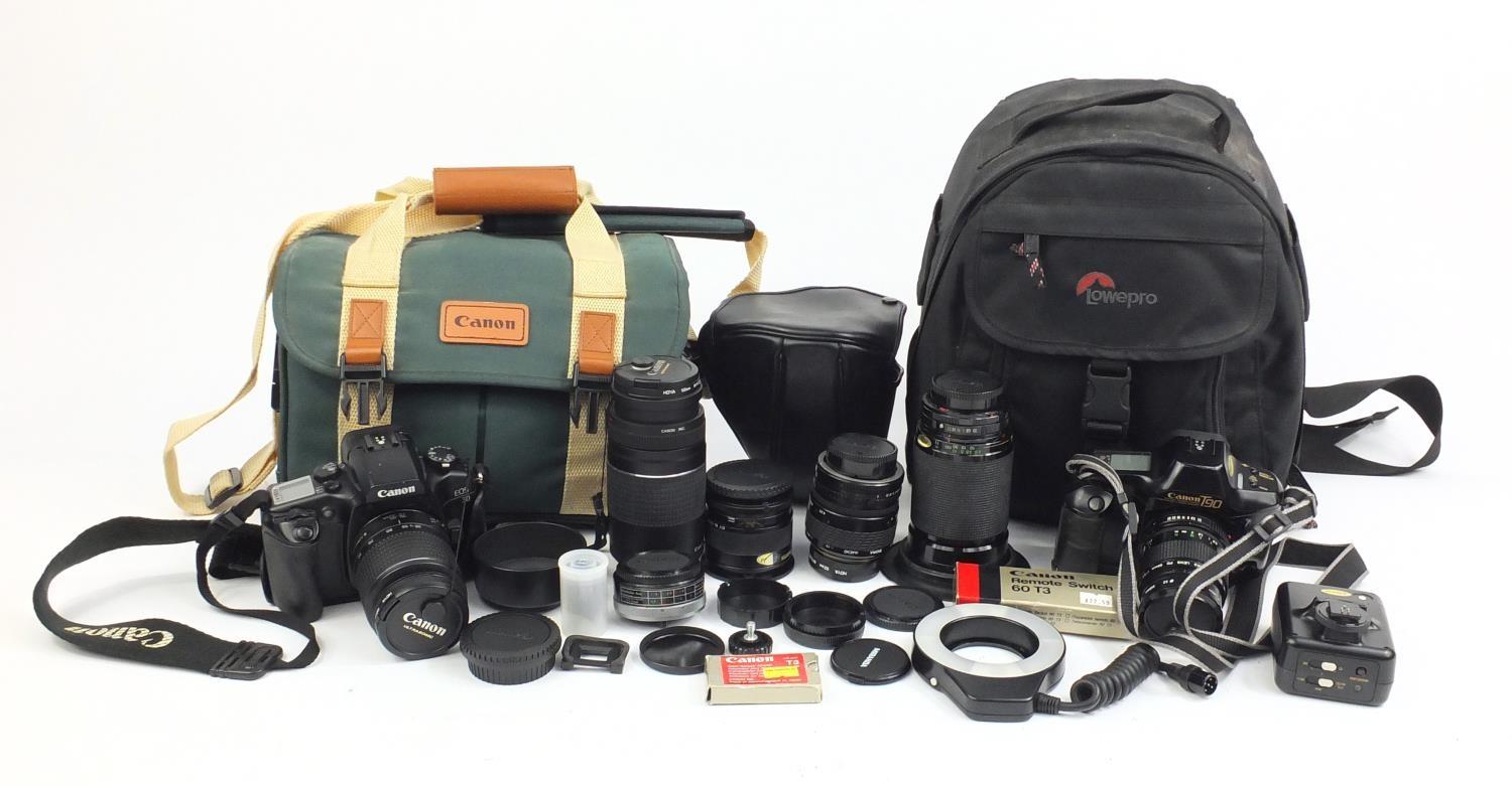 Two Canon camera outfits, Canon T90 and Canon EOS30 bodies with lenses including Tamron, both with
