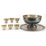 Silver plated punch bowl with tray and six punch cups, the bowl 22.5cm high, the tray 50.5cm in