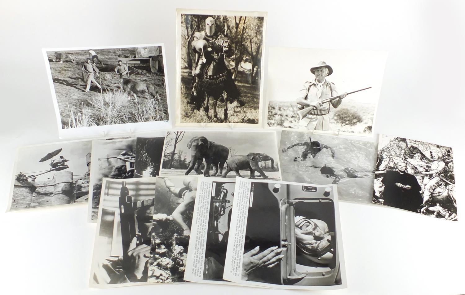 Vintage black and white stage photographs including Huskie, Walt Disney Productions, Signs of