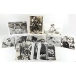 Vintage black and white stage photographs including Huskie, Walt Disney Productions, Signs of