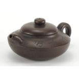 Chinese Yixing terracotta squatted teapot, incised with calligraphy and flowers, character marks