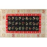 Rectangular Bessarabian Kilim rug, having an all over stylised floral design, approximately 262cm
