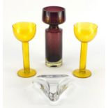 Art glassware including a pair of Swedish yellow glass goblets and a Baccarat triangular dish, the