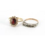 9ct gold garnet and cubic zirconia ring and a 9ct gold and silver clear stone ring, both size L,
