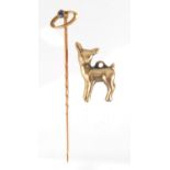 Unmarked gold fawn charm and sapphire tie pin, approximate weight 4.5g : For Further Condition