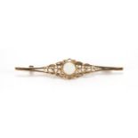 9ct gold cabochon opal bar brooch, 5,5cm In length, approximate weight 2.8g : For Further