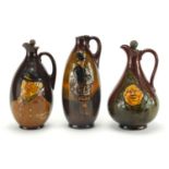 Three Royal Doulton Kingsware Dewar's Whisky decanters, including Sporting Squire and The McNab,