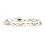 9ct gold diamond crossover bracelet, 19cm in length, approximate weight 5.8g : For Further Condition