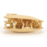 Japanese ivory clamshell internally carved with figures, 7cm wide :For Further Condition Reports