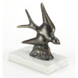Art Deco bronze swallow sculpture, signed Pepin, raised on rectangular white marble base, overall