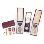 Six Masonic jewels and a pin badge, the jewels including four silver, one with enamel engraved