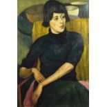 Portrait of a female in an interior, oil on canvas, bearing a signature Wolmark, mounted and framed,