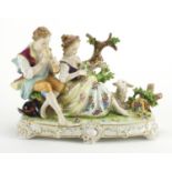 Dresden hand painted porcelain figure group of two lovers and a goat, numbered 8857, 25cm in