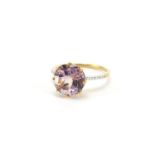 9ct gold purple stone ring with diamond shoulders, size N, approximate weight 2.2g : For Further