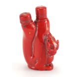Chinese carved coral double lion snuff bottle with stoppers, 10cm high :For Further Condition