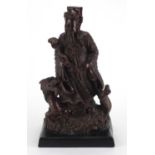 Chinese bronzed metal figure of an emperorstanding on a dragon, 44cm high : For Further Condition