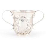18th century silver twin handled loving cup with embossed demi fluted decoration and blank