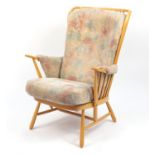 Ercol light elm Evergreen stick back armchair, with floral button back upholstery, 102cm high :