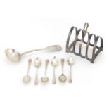 Silver items comprising Viners four slice toast rack, Victorian ladle and set of six teaspoons,