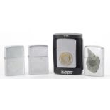 Four Zippo pocket lighters including two Harley Davidson and a US Naval Activities example : For