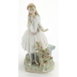 Lladro figurine of a girl holding a flower, 29cm high : For Further Condition Reports Please Visit