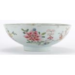 Chinese porcelain footed bowl, hand painted in the famille rose palette with flowers, 19cm in