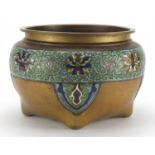 Large Chinese brass and cloisonne four footed censer, enamelled with flower heads amongst foliate