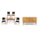 Gordon Russell oak dining suite, comprising an extending dining table with four chairs and a