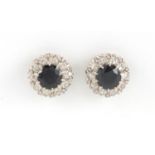 Pair of unmarked gold sapphire and diamond stud earrings, 1cm in diameter, approximate weight 4.