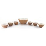 Italian pottery coconut design punch set comprising a bowl and six beakers, each inscribed Italy