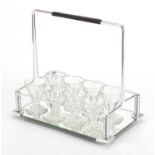 Set of eight Baccarat crystal liqueur glasses with chrome and glass tray, each glass 6.5cm high :