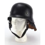 German Military World War II Red Cross helmet, pattern M34, with decals, numbered 55 to the