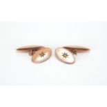 Pair of 9ct gold diamond cuff links, 2cm in length, approximate weight 6.4g : For Further
