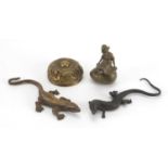 Early 20th century Austrian Patinated bronze lizard, together with two brass paperweights and a