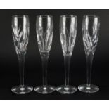 Four Waterford Crystal champagne flutes by John Rocha, boxed, 26cm high : For Further Condition