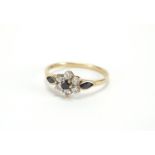 9ct gold black and clear stone flower head ring, size M, approximate weight 1.7g : For Further