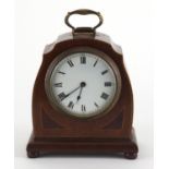 Inlaid mahogany mantel clock with brass handle, enamelled dial and Roman numerals, the movement