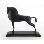 Modernist patinated bronze study of a stylised horse raised on a rectangular base, overall 29cm high