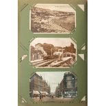 Edwardian and later postcards, some photographic arranged in an album including The George V