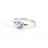18ct whit gold gold tanzanite and diamond ring, size U, approximate weight 3.3g :For Further