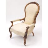 Victorian carved walnut gentleman's chair, with beige floral upholstery, 101.5cm high : For