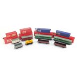 Hornby Dublo model railway with boxes including Tank Wagon Chlorine 4675, Suburban Coach 4025 and