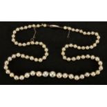 Cultured pearl necklace with 9ct gold clasp, housed in an Ernest Laycock tooled leather box, 42cm in