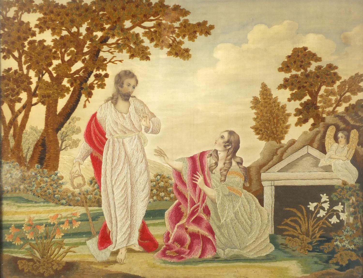 Georgian silk work panel embroidered with two figures beside an angel, mounted and framed, 49cm x