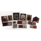 Thirteen 19th century black and white Ambrotypes including one housed in a moulded thermo plastic