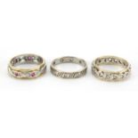 Three 9ct gold eternity rings, set with clear and pink stones, various sizes, approximate weight 8.