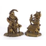 Pair of Victorian gilt brass Punch and Judy fire dogs, the largest 30cm high : For Further Condition